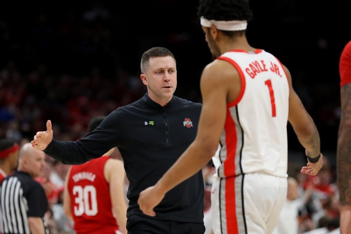 Feb 29, 2024; Columbus, Ohio, USA;  Ohio State Buckeyes head coach Jake Diebler congratulates guard Roddy Gayle Jr. (1) during the first half against the Nebraska Cornhuskers at Value City Arena.