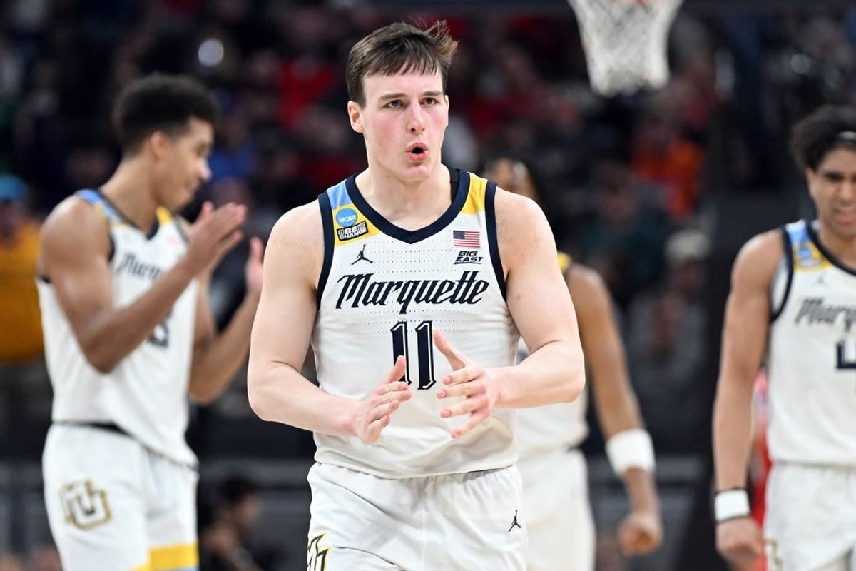 Mar 22, 2024; Indianapolis, IN, USA; Marquette Golden Eagles guard Tyler Kolek (11) reacts in the second half against the Western Kentucky Hilltoppers in the first round of the 2024 NCAA Tournament at Gainbridge FieldHouse.