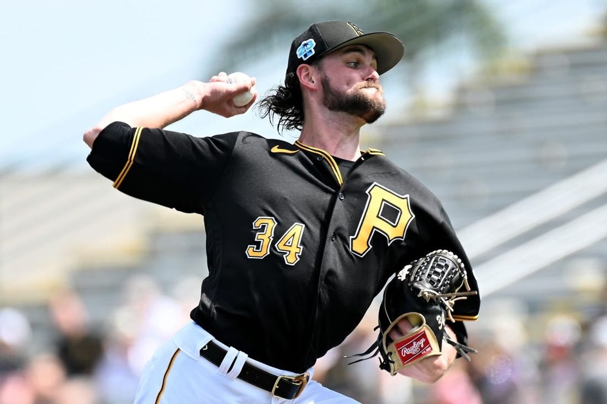 Mar 5, 2023; Bradenton, Florida, USA; Pittsburgh Pirates pitcher JT Brubaker (34) throws a pitch in the first inning of a spring training game against the Minnesota Twins at LECOM Park.