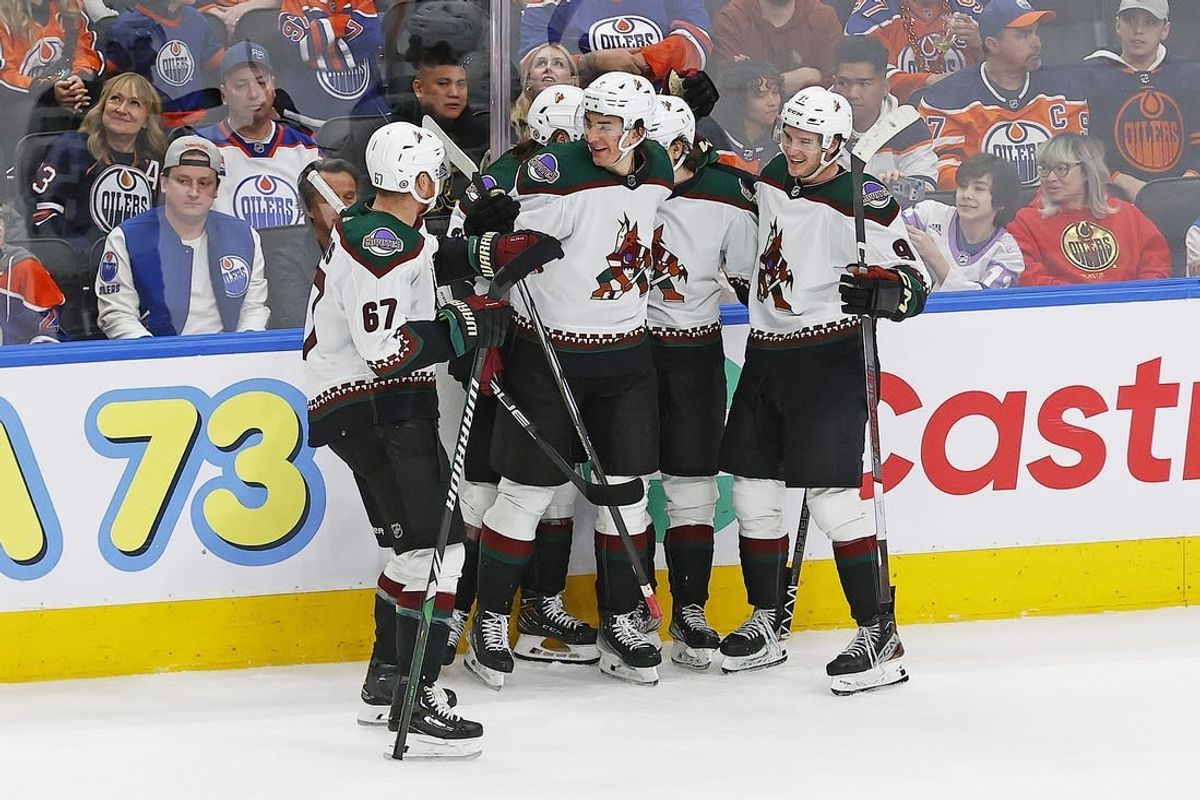 Apr 12, 2024; Edmonton, Alberta, CAN; The Arizona Coyotes celebrate a goal scored by  forward Matias Maccelli (63) during overtime against the Edmonton Oilers at Rogers Place.