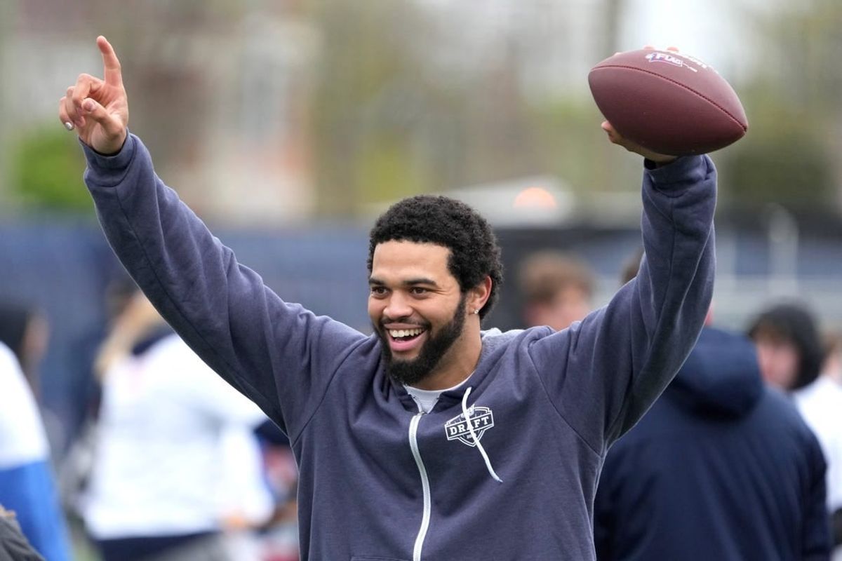Apr 24, 2024; Detroit, MI, USA; Southern California Trojans quarterback Caleb Williams reacts at the Play Football Prospect Clinic at The Corner Ballpark.