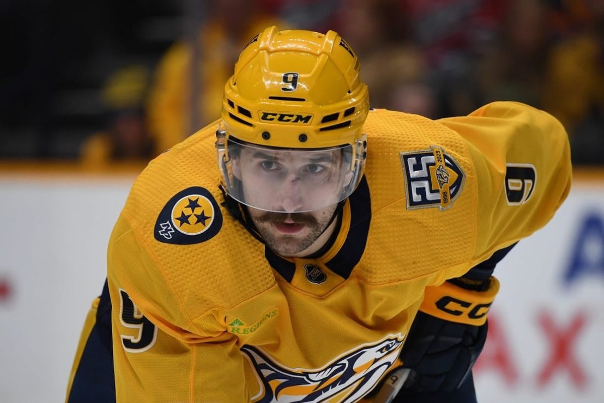 Dec 16, 2023; Nashville, Tennessee, USA; Nashville Predators left wing Filip Forsberg (9) waits for a face off during the third period against the Washington Capitals at Bridgestone Arena.