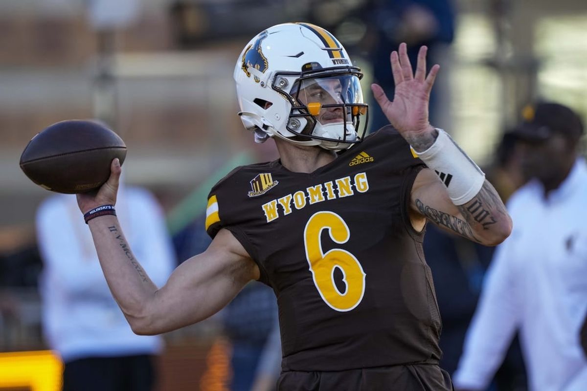 Oct 7, 2023; Laramie, Wyoming, USA; Wyoming Cowboys quarterback Andrew Peasley (6) warms up before game against the Fresno State Bulldogs at Jonah Field at War Memorial Stadium.