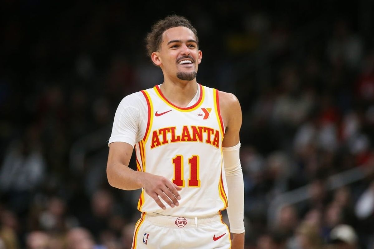Jan 10, 2024; Atlanta, Georgia, USA; Atlanta Hawks guard Trae Young (11) reacts against the Philadelphia 76ers in overtime at State Farm Arena.