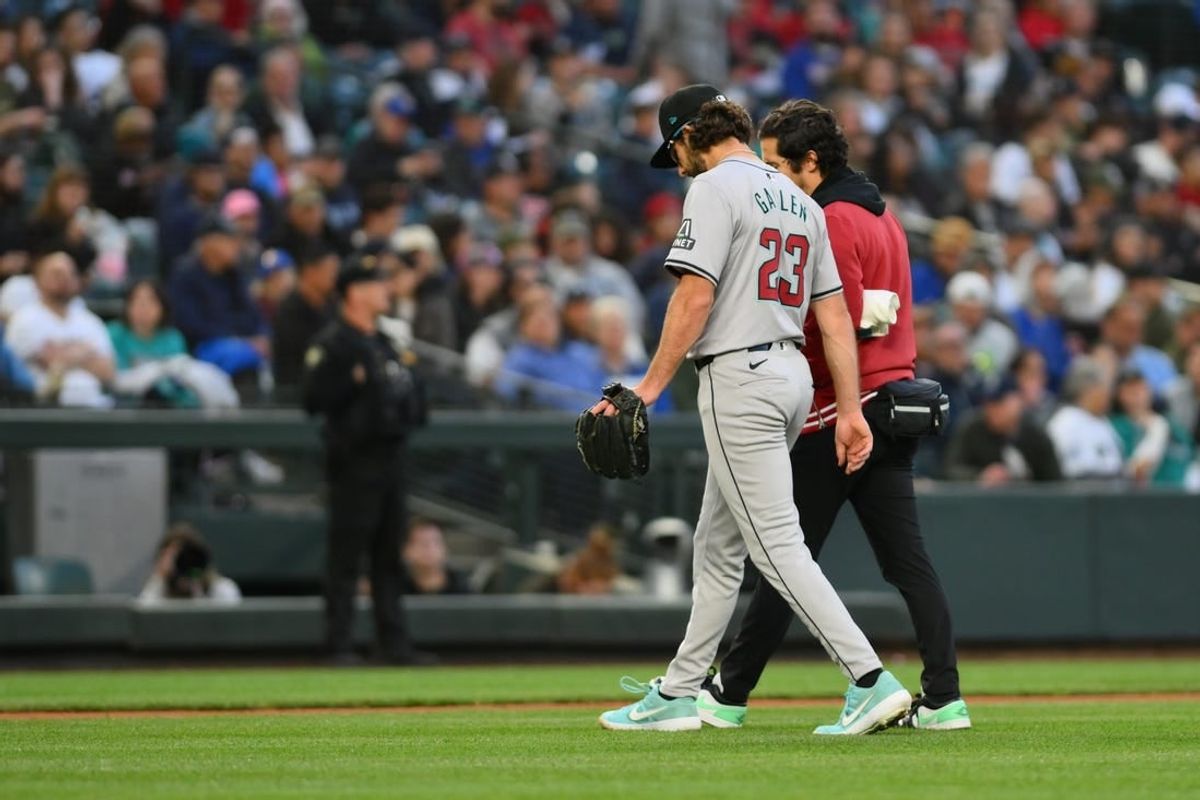 Apr 26, 2024; Seattle, Washington, USA; Arizona Diamondbacks starting pitcher Zac Gallen (23) leaves the game with an apparent injury during the sixth inning against the Seattle Mariners at T-Mobile Park.