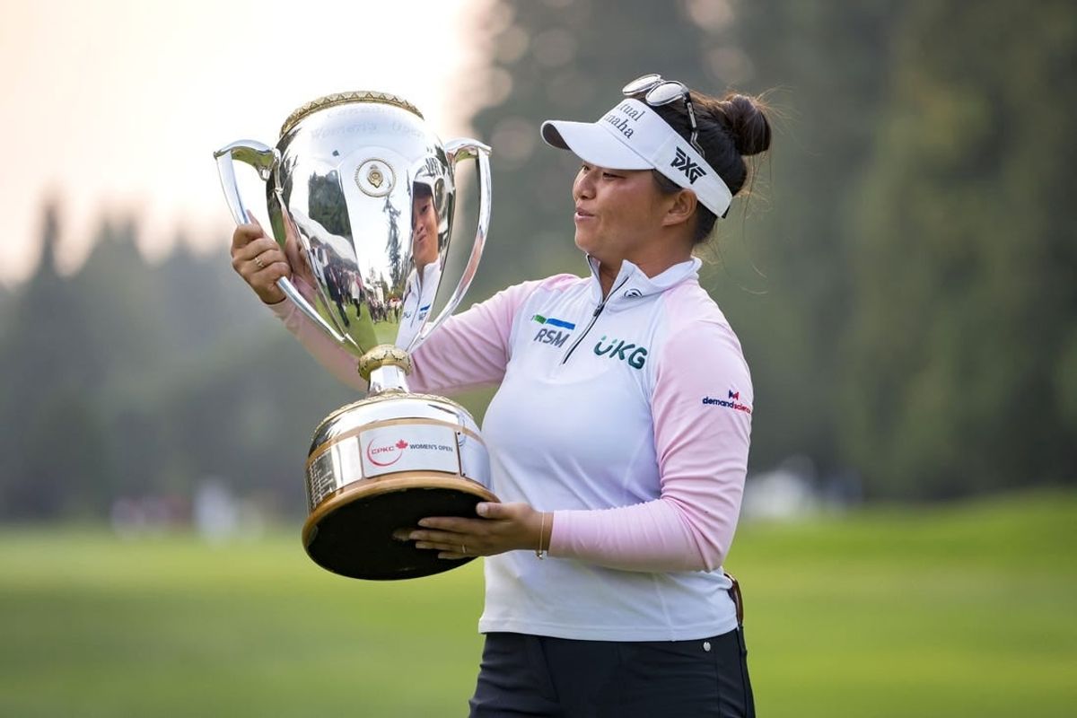 Aug 27, 2023; Vancouver, British Columbia, CAN; Megan Khang holds the championship trophy after the final round of the CPKC Women's Open golf tournament at Shaughnessy Golf & Country Club.