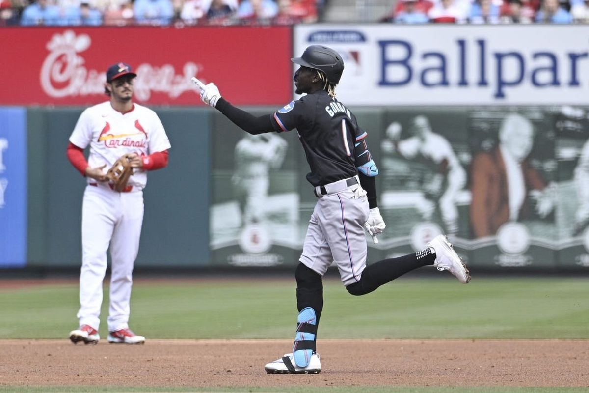 Apr 7, 2024; St. Louis, Missouri, USA; Miami Marlins outfielder Nick Gordon (1) reacts after hitting a three run homerun against the St. Louis Cardinals during the first inning at Busch Stadium.