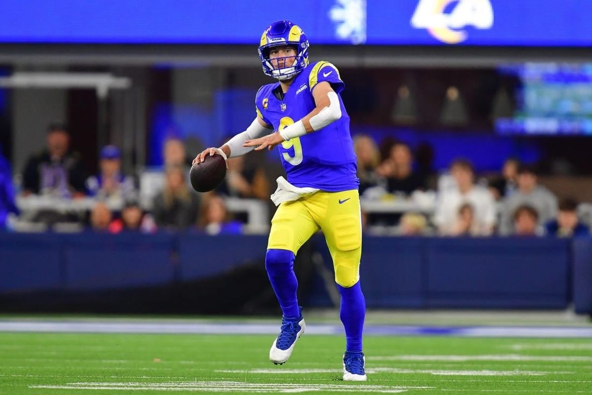 Dec 21, 2023; Inglewood, California, USA; Los Angeles Rams quarterback Matthew Stafford (9) throws against the New Orleans Saints during the first half at SoFi Stadium.