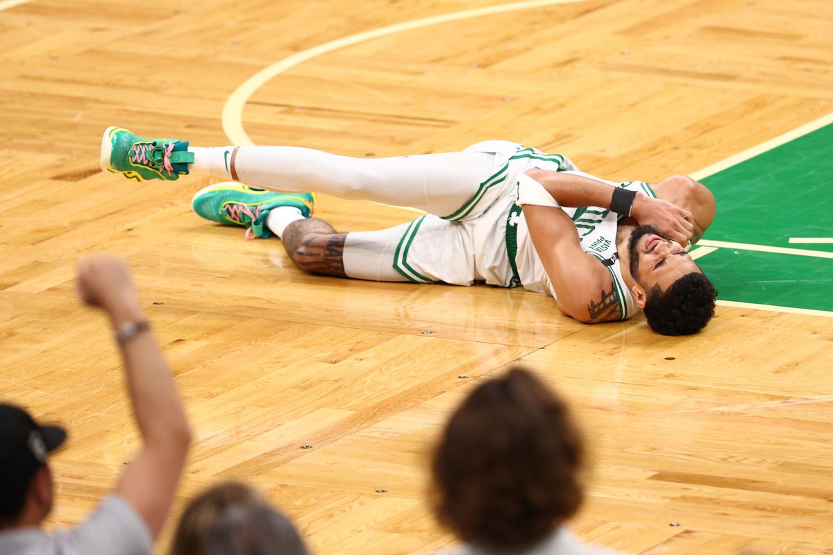 Jayson Tatum goes down.