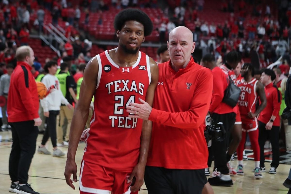 Mar 9, 2024; Lubbock, Texas, USA;  Texas Tech Red Raiders guard Kerwin Walton (24) with assistant coach Dave Smart after the game against the Baylor Bears at United Supermarkets Arena.