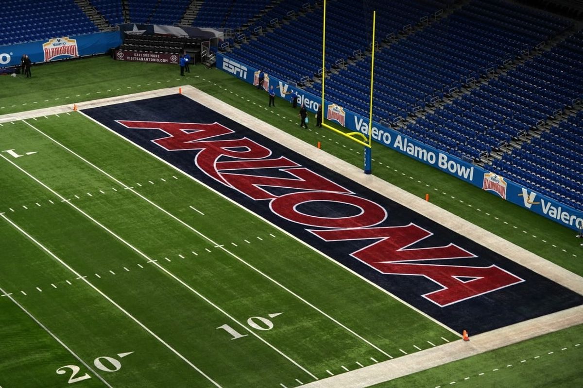 Dec 28, 2023; San Antonio, TX, USA; The Arizona Wildcats logo in the end zone at Alamodome.