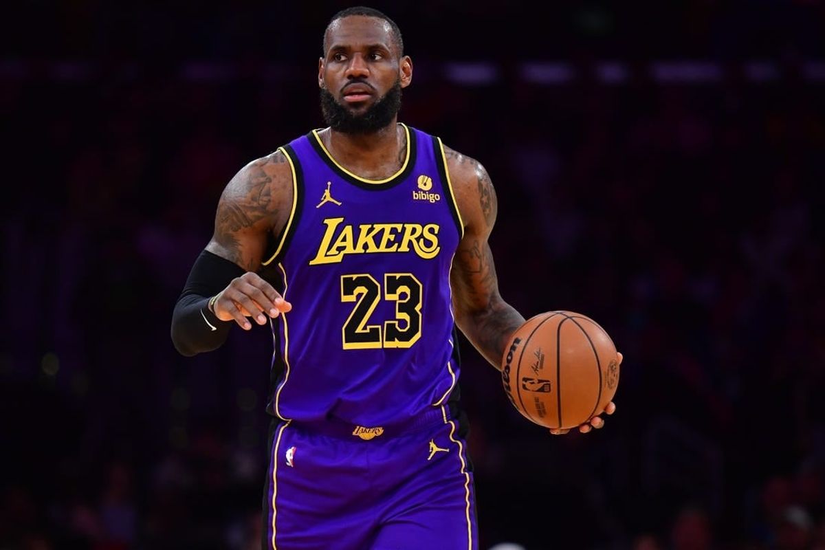 Jan 11, 2024; Los Angeles, California, USA; Los Angeles Lakers forward LeBron James (23) controls the ball against the Phoenix Suns during the second half at Crypto.com Arena.