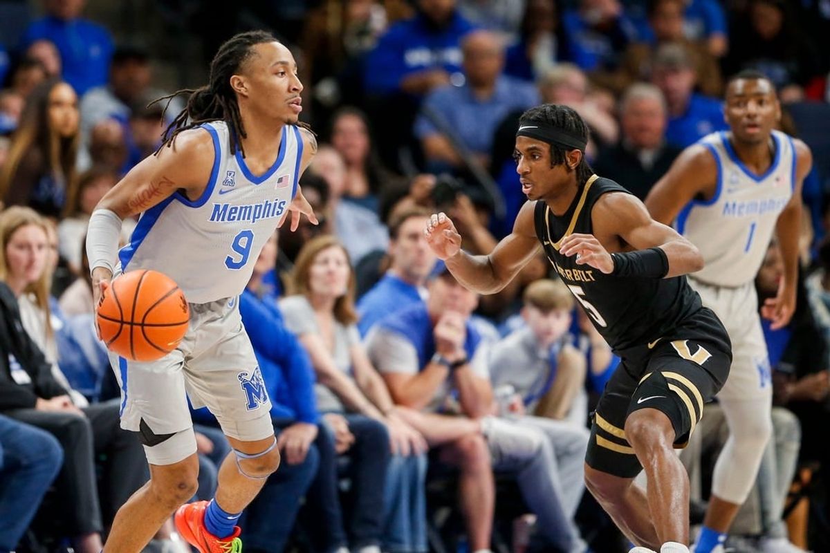 Memphis' Caleb Mills (9) prepares to drive to the basket during the game between Vanderbilt University and University of Memphis at FedExForum in Memphis, Tenn., on Saturday, December 23, 2023.