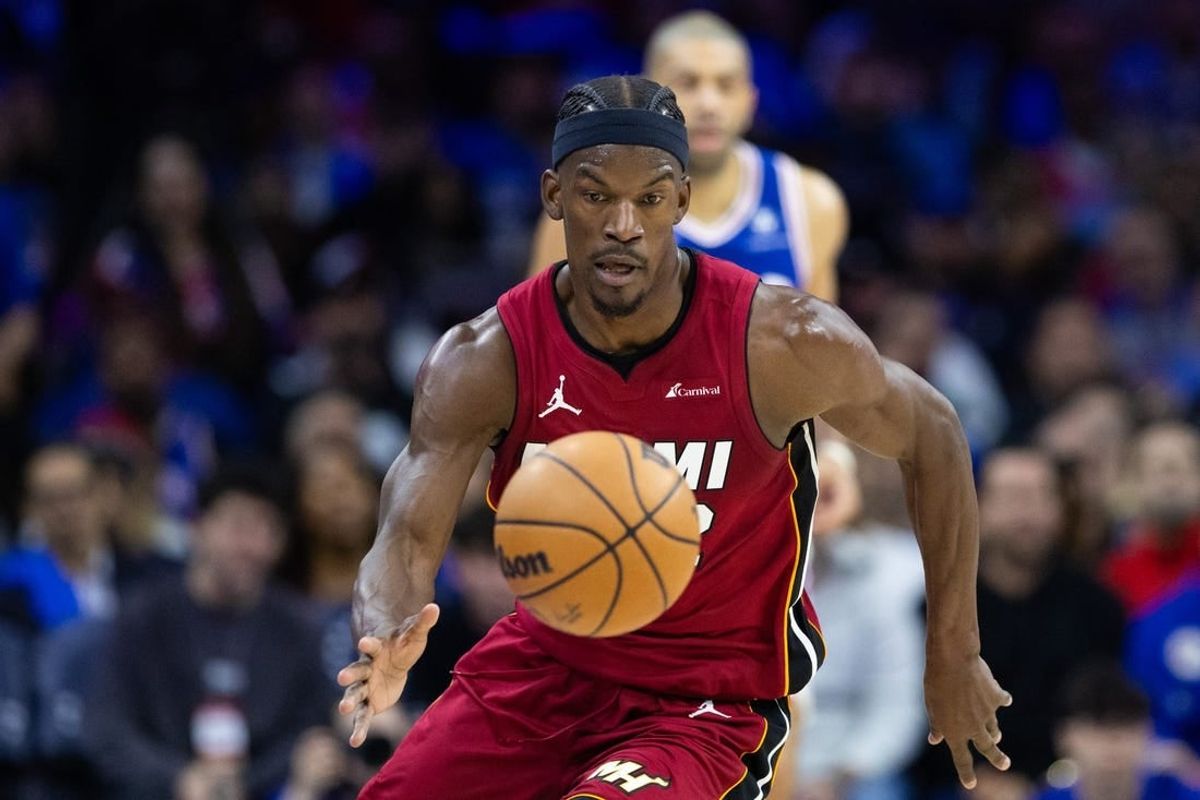 Apr 17, 2024; Philadelphia, Pennsylvania, USA; Miami Heat forward Jimmy Butler (22) picks up a loose ball against the Philadelphia 76ers during the second quarter of a play-in game of the 2024 NBA playoffs at Wells Fargo Center.