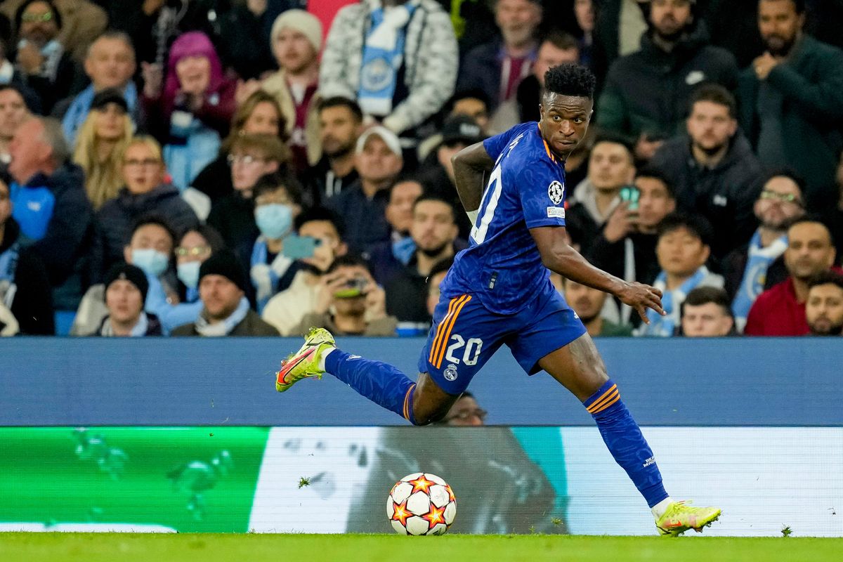 Real Madrid’s Brazilian striker Vinicius Junior controls the ball during the UEFA Champions League semi-final first leg football match between Manchester City and Real Madrid, at the Etihad Stadium.