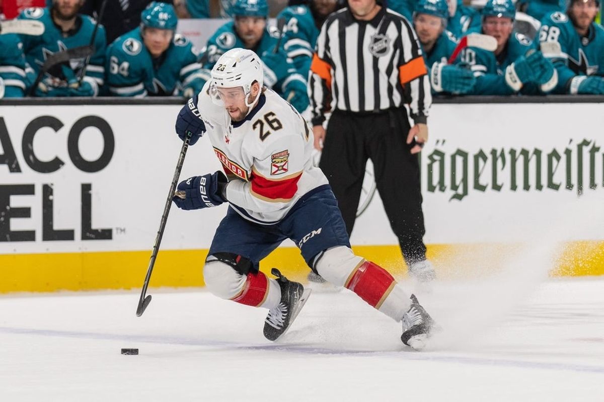 Nov 14, 2023; San Jose, California, USA; Florida Panthers defenseman Uvis Balinskis (26) controls the puck during the first period against the San Jose Sharks at SAP Center at San Jose.