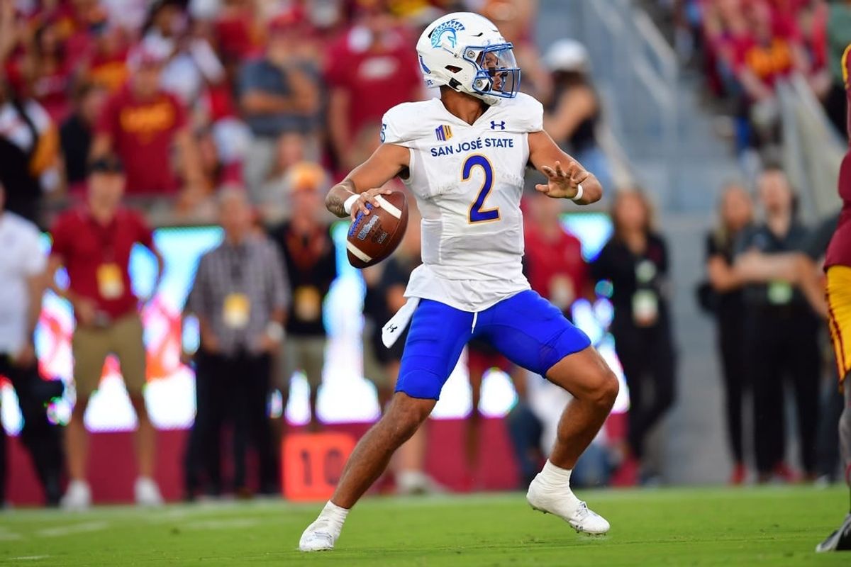 Aug 26, 2023; Los Angeles, California, USA; San Jose State Spartans quarterback Chevan Cordeiro (2) drops back to pass against the Southern California Trojans during the first half at Los Angeles Memorial Coliseum.