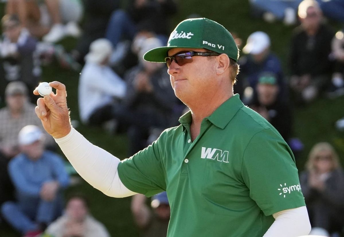 Feb 11, 2024; Scottsdale, AZ, USA; Charley Hoffman finishes with in the lead on the 18th hole during the final round of the WM Phoenix Open at TPC Scottsdale.