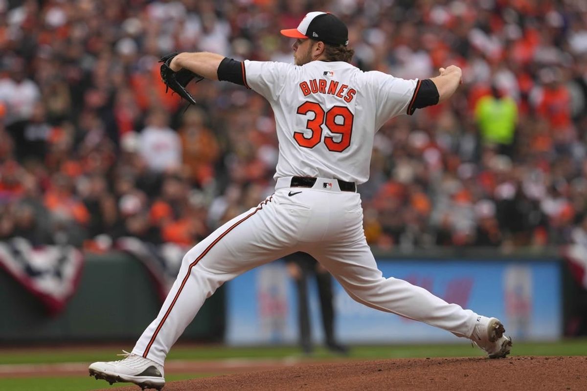 Mar 28, 2024; Baltimore, Maryland, USA; Baltimore Orioles pitcher Corbin Burnes (39) delivers in the first inning against the Los Angeles Angels at Oriole Park at Camden Yards.