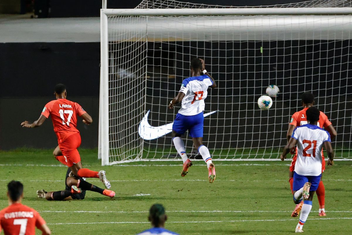 Canada’s Cyle Larin scores past Haiti’s Josué Duverger on Tuesday . The keeper would go on to notch  a soul-crushing own goal one day later.