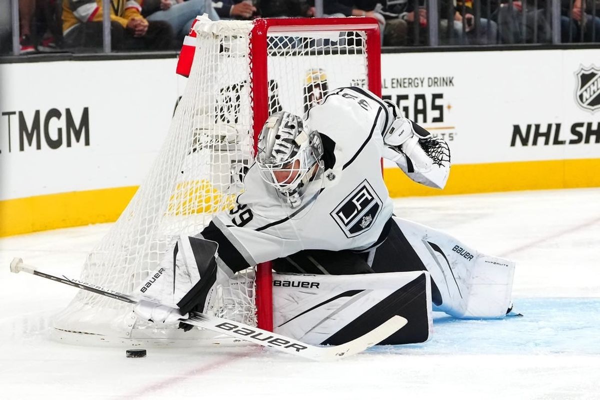 Nov 8, 2023; Las Vegas, Nevada, USA; Los Angeles Kings goaltender Cam Talbot (39) covers up a Vegas Golden Knights dump in during the second period at T-Mobile Arena.
