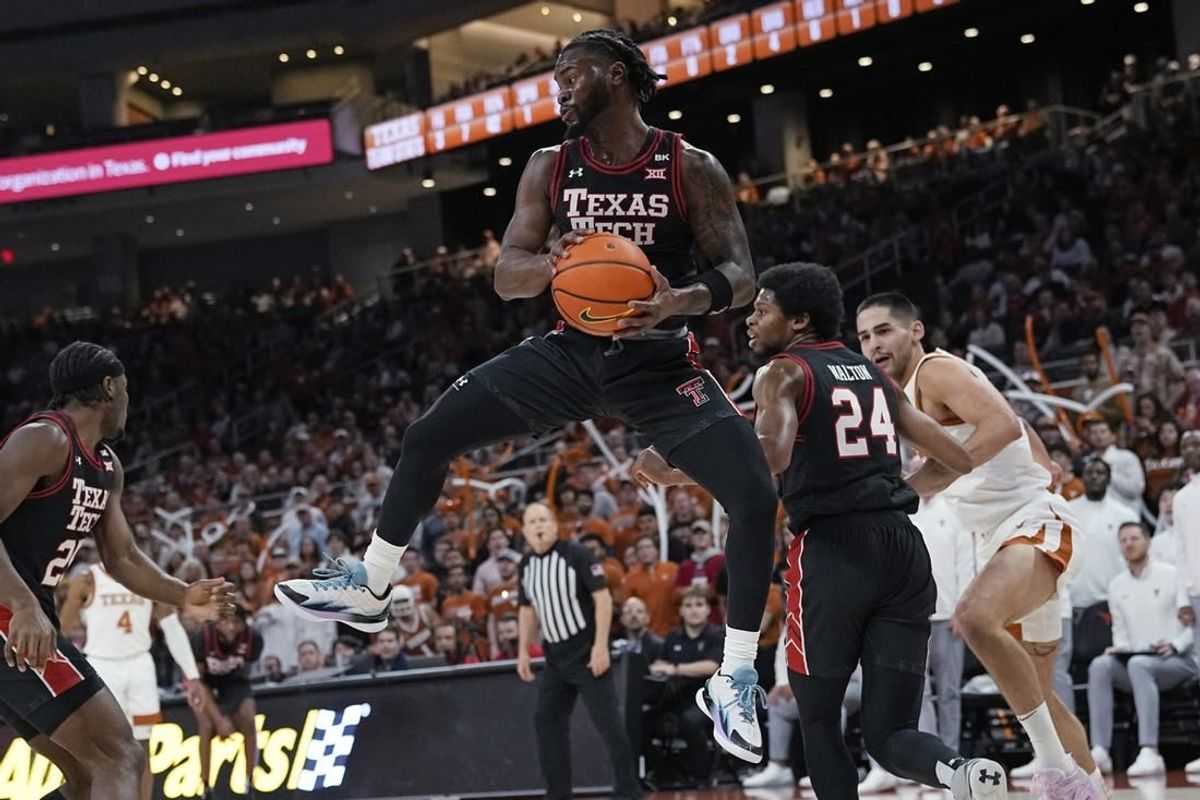 Jan 6, 2024; Austin, Texas, USA; Texas Tech Red Raiders guard Joe Toussaint (6) grabs a rebound during the first half against the Texas Longhorns at Moody Center.
