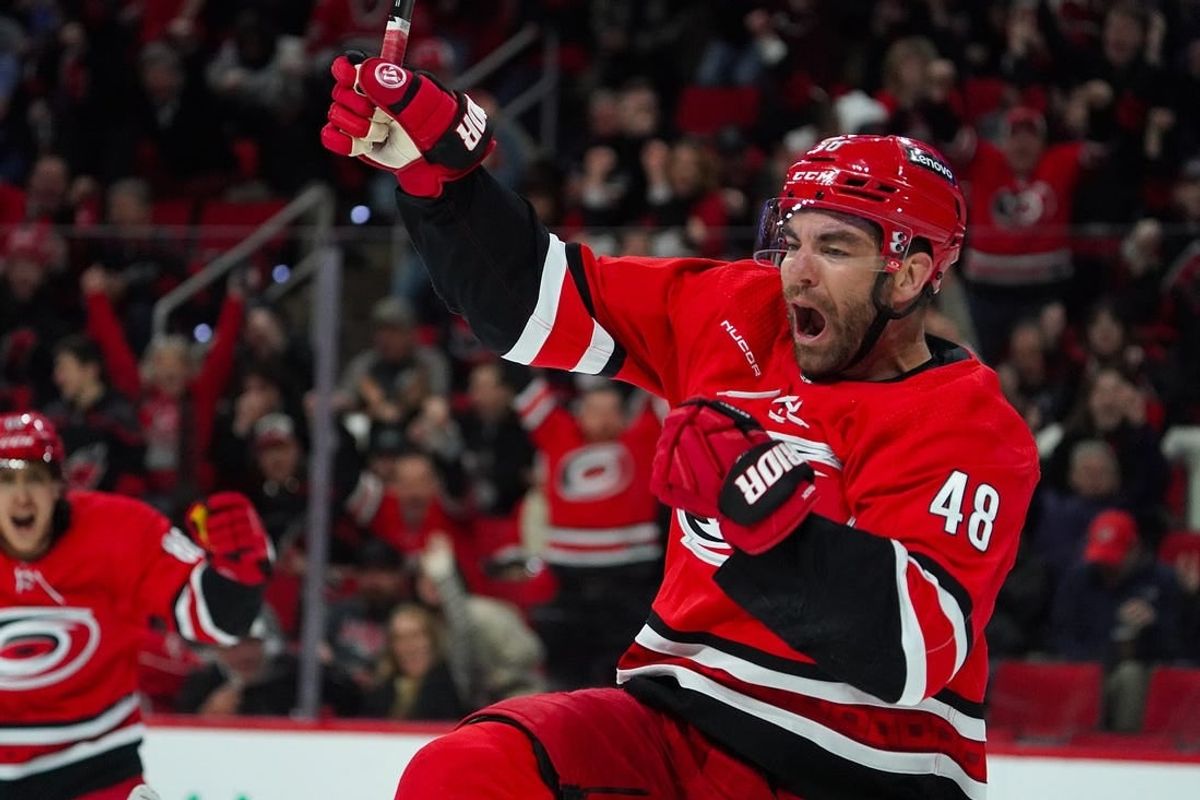 Feb 6, 2024; Raleigh, North Carolina, USA; Carolina Hurricanes left wing Jordan Martinook (48) celebrates his goal against the Vancouver Canucks during the first period at PNC Arena.