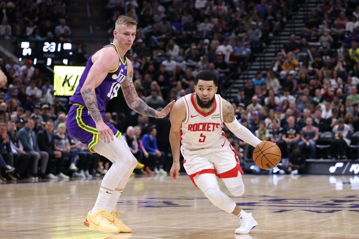 Apr 11, 2024; Salt Lake City, Utah, USA; Houston Rockets guard Fred VanVleet (5) dribbles past Utah Jazz forward Luka Samanic (19) during the third quarter at Delta Center.