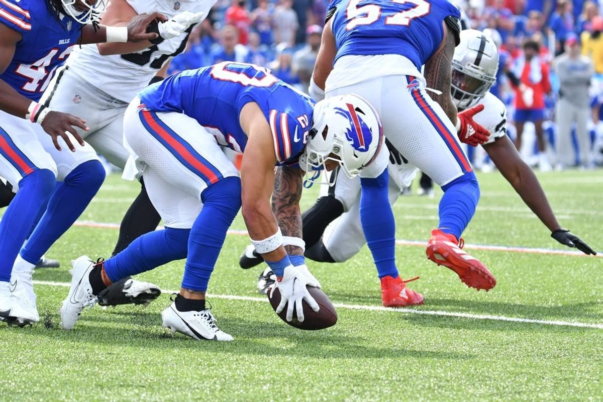 Sep 17, 2023; Orchard Park, New York, USA; Buffalo Bills safety Taylor Rapp (20) picks up a fumble by the Las Vegas Raiders in the fourth quarter at Highmark Stadium.