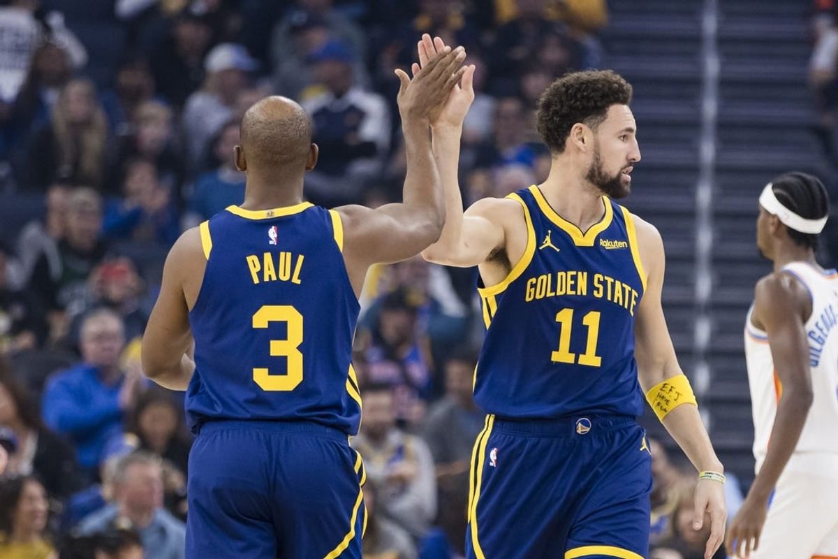 Nov 18, 2023; San Francisco, California, USA; Golden State Warriors guard Chris Paul (3) congratulates guard Klay Thompson (11) after he was fouled by a Oklahoma City Thunder   s player during the first half at Chase Center.