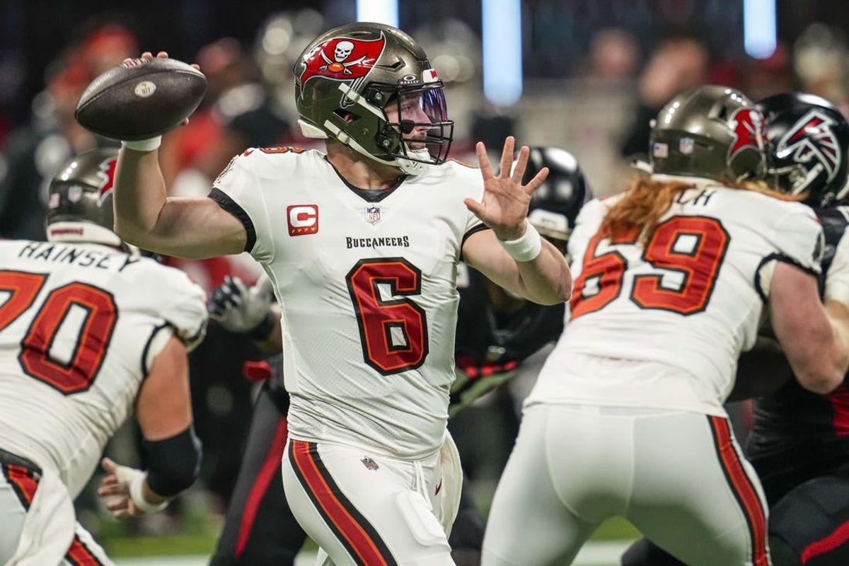 Dec 10, 2023; Atlanta, Georgia, USA; Tampa Bay Buccaneers quarterback Baker Mayfield (6) passes the ball against the Atlanta Falcons during the first quarter at Mercedes-Benz Stadium.