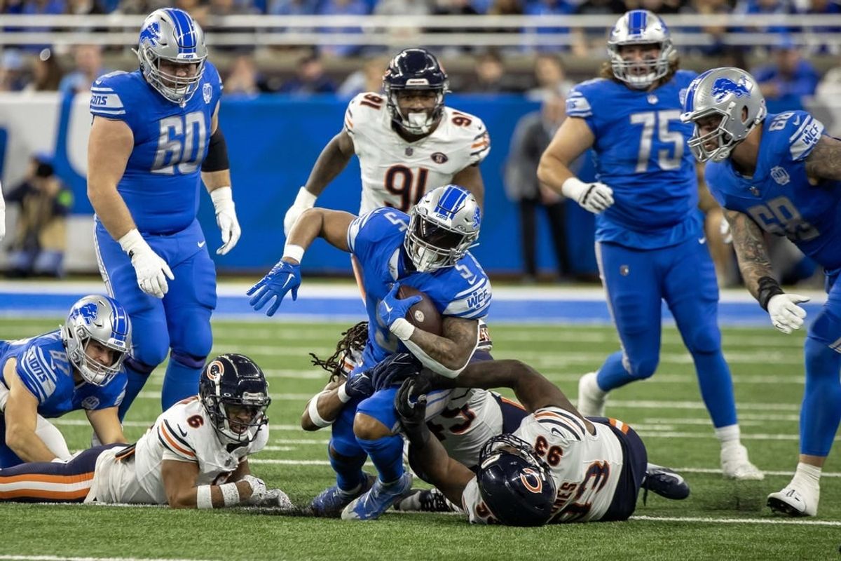 Nov 19, 2023; Detroit, Michigan, USA; Detroit Lions running back David Montgomery (5) runs with the ball against the Chicago Bears during the first half at Ford Field.