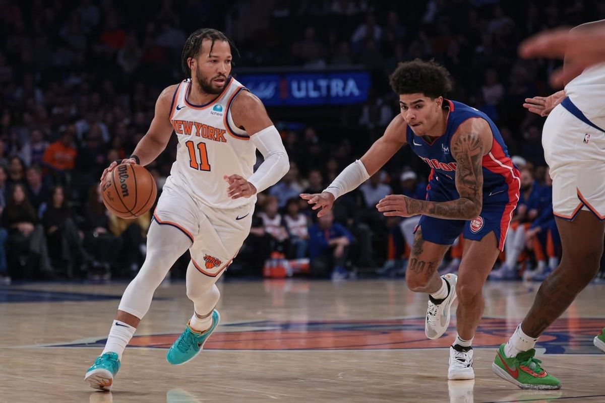 Nov 30, 2023; New York, New York, USA; New York Knicks guard Jalen Brunson (11) dribbles as Detroit Pistons guard Killian Hayes (7) defends during the first half at Madison Square Garden.