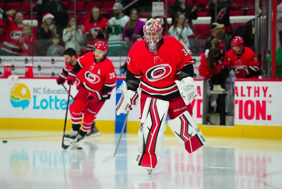 Dec 15, 2023; Raleigh, North Carolina, USA; Carolina Hurricanes goaltender Antti Raanta (32) skates out onto the ice before the game against the Nashville Predators at PNC Arena.