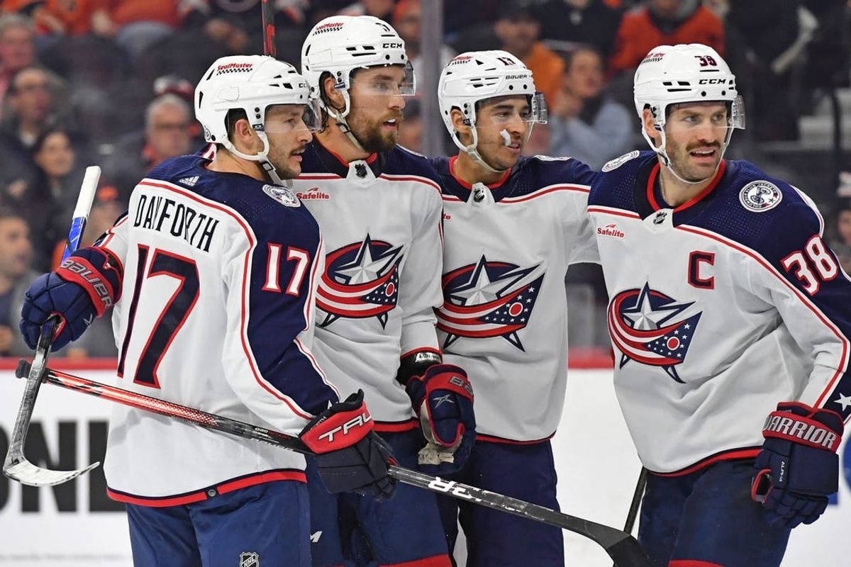 Nov 19, 2023; Philadelphia, Pennsylvania, USA; Columbus Blue Jackets defenseman Ivan Provorov (9) celebrates his goal with with teammates against the Philadelphia Flyers during the second period at Wells Fargo Center.