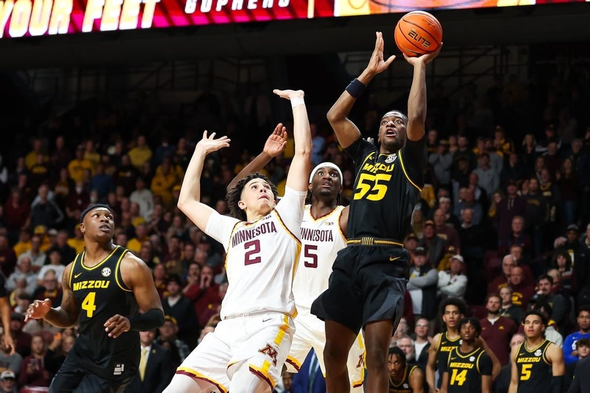 Nov 16, 2023; Minneapolis, Minnesota, USA; Missouri Tigers guard Sean East II (55) shoots against the Minnesota Golden Gophers during the second half at Williams Arena.