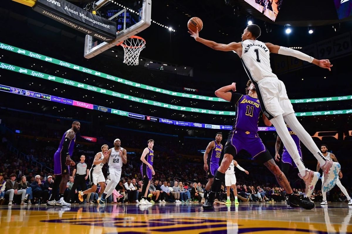 Feb 23, 2024; Los Angeles, California, USA; San Antonio Spurs center Victor Wembanyama (1) shoots against Los Angeles Lakers center Jaxson Hayes (11) during the second half at Crypto.com Arena.