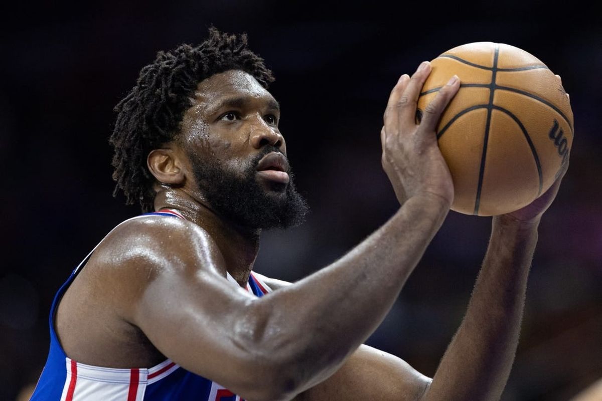 Jan 15, 2024; Philadelphia, Pennsylvania, USA; Philadelphia 76ers center Joel Embiid (21) shoots a foul shot against the Houston Rockets during the second quarter at Wells Fargo Center.