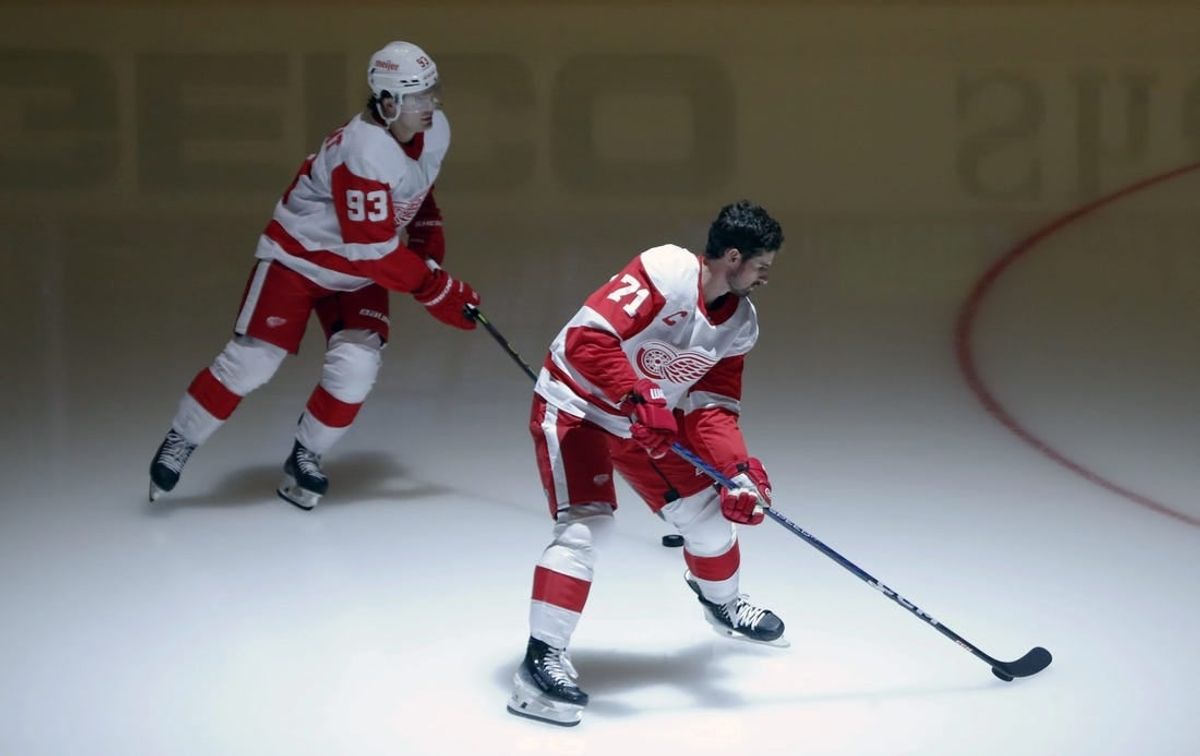 Oct 4, 2023; Pittsburgh, Pennsylvania, USA; Detroit Red Wings right wing Alex DeBrincat (93) and center Dylan Larkin (71) takes the ice to warm up before the game against the Pittsburgh Penguins at PPG Paints Arena.