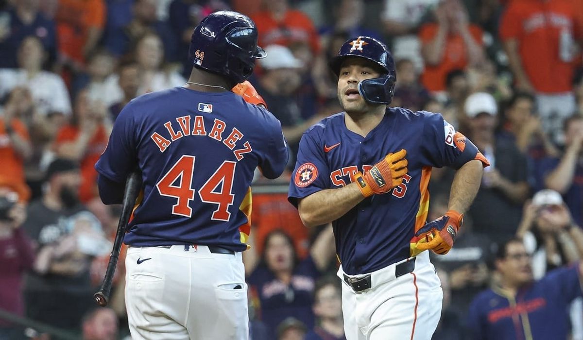 Apr 14, 2024; Houston, Texas, USA; Houston Astros second baseman Jose Altuve (27) celebrates with left fielder Yordan Alvarez (44) after hitting a home run during the third inning against the Texas Rangers at Minute Maid Park.