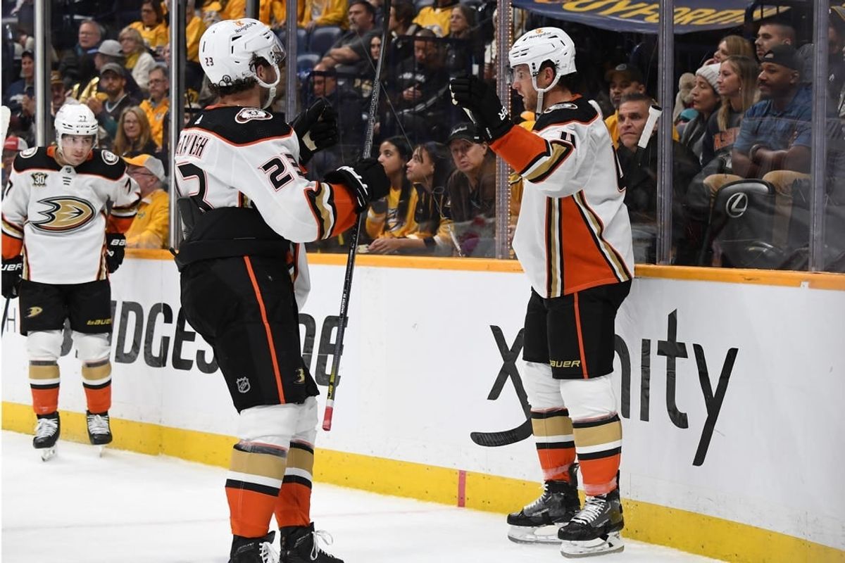 Nov 14, 2023; Nashville, Tennessee, USA; Anaheim Ducks defenseman Cam Fowler (4) celebrates after a goal during the second period against the Nashville Predators at Bridgestone Arena.