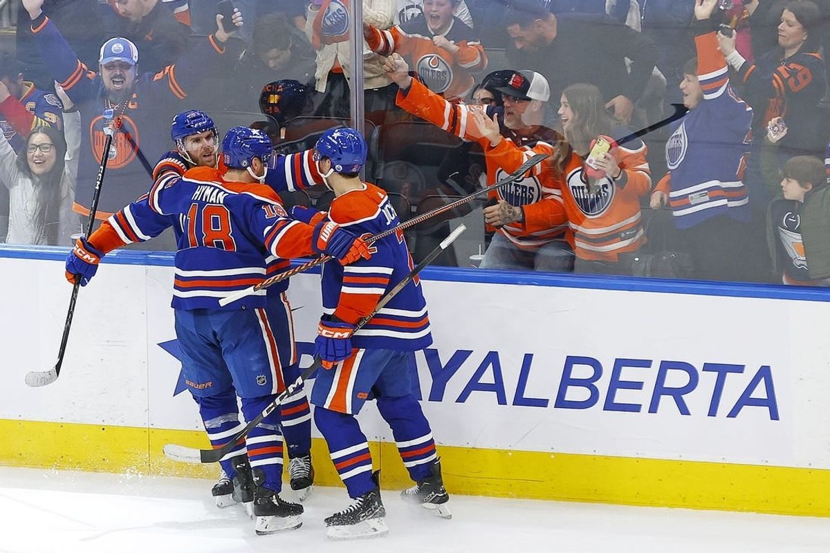 Feb 28, 2024; Edmonton, Alberta, CAN; The Edmonton Oilers celebrate a goal scored by forward Connor McDavid (97) during overtime against the St. Louis Blues at Rogers Place.