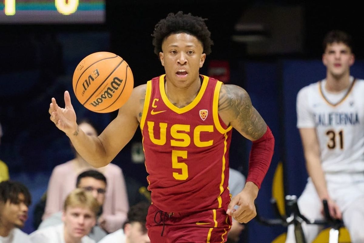 Feb 7, 2024; Berkeley, California, USA; USC Trojans guard Boogie Ellis (5) dribbles the ball against the California Golden Bears during the second half at Haas Pavilion.