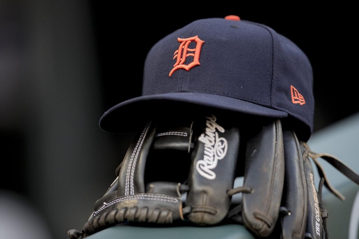 Apr 21, 2017; Minneapolis, MN, USA; A detailed view of a Detroit Tigers hat sitting on top of a glove in the dugout before a game between the Detroit Tigers and Minnesota Twins at Target Field. Mandatory Credit: Jesse Johnson-Imagn Images