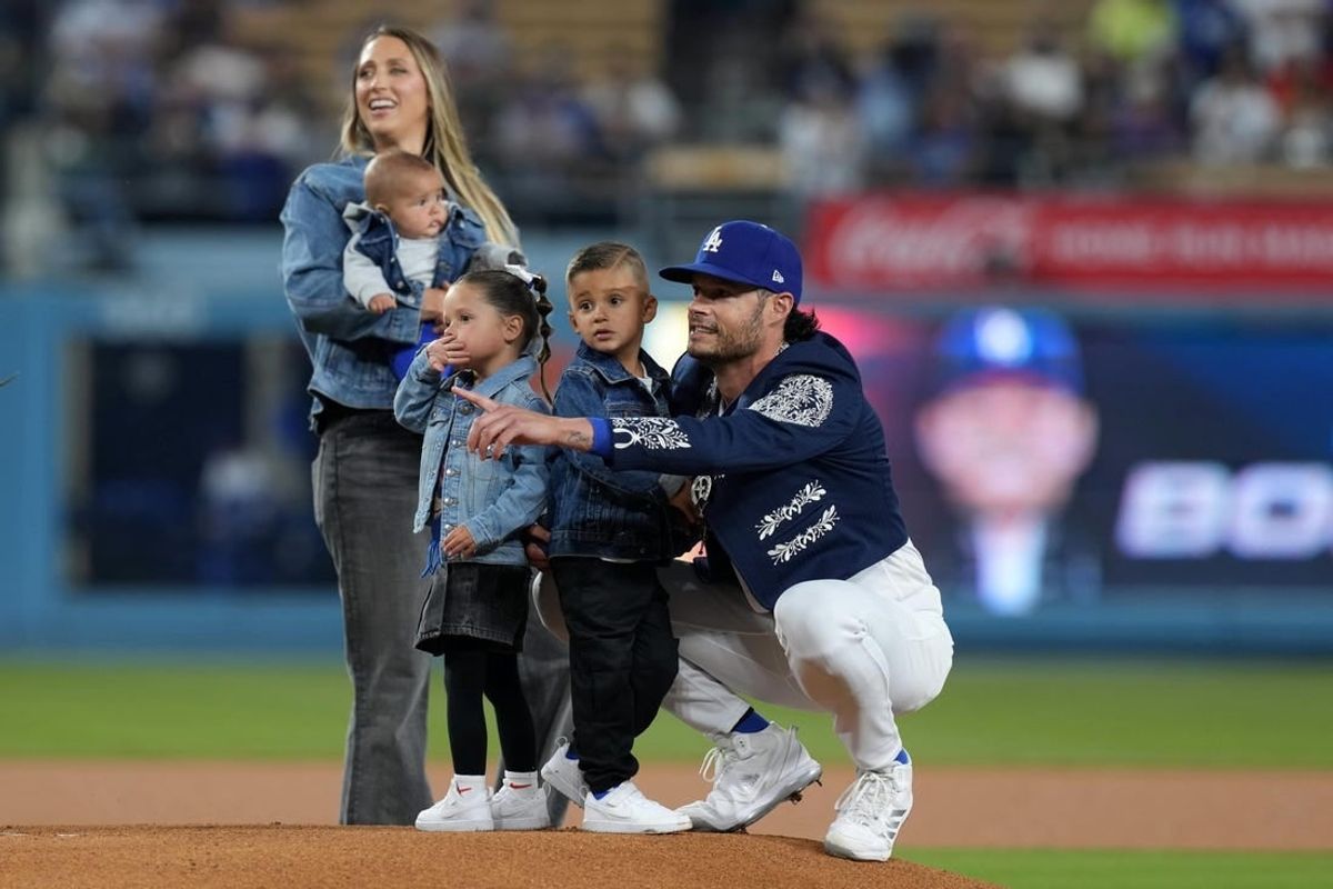 Sep 22, 2023; Los Angeles, California, USA; Los Angeles Dodgers relief pitcher Joe Kelly (17) poses with wife Ashley Kelly (Ashley Parks) and children, sons Knox Kelly and Kai Kelly and twins Crue Kelly and Blake Kelly, at Dodger Stadium.