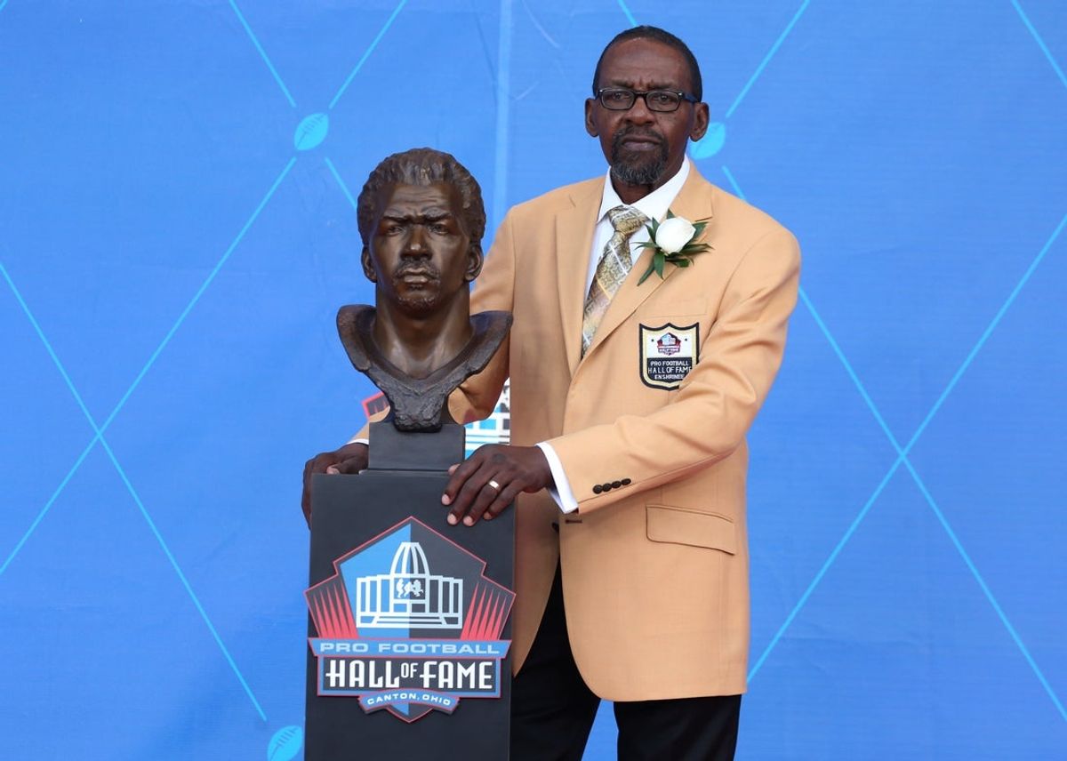Aug 5, 2017; Canton, OH, USA;  Seattle Seahawks former safety Kenny Easley with his bust during the Professional Football HOF enshrinement ceremonies at the Tom Benson Hall of Fame Stadium. Mandatory Credit: Charles LeClaire-Imagn Images