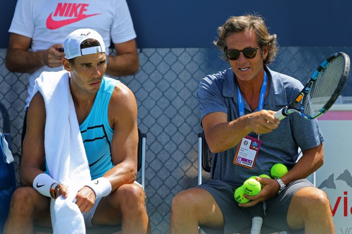 Aug 13, 2017; Mason, OH, USA; Rafael Nadal (ESP) talks with Francisco Roig (right) on the practice court during the Western and Southern Open at Lindner Family Tennis Center. Mandatory Credit: Aaron Doster-Imagn Images