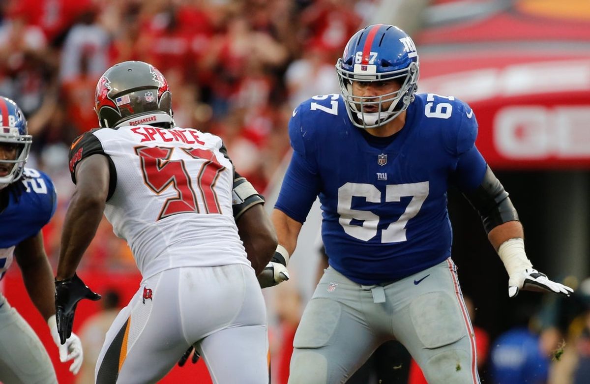 Oct 1, 2017; Tampa, FL, USA; New York Giants offensive guard Justin Pugh (67) blocks as Tampa Bay Buccaneers defensive end Noah Spence (57) rushes during the second half at Raymond James Stadium. Mandatory Credit: Kim Klement-Imagn Images