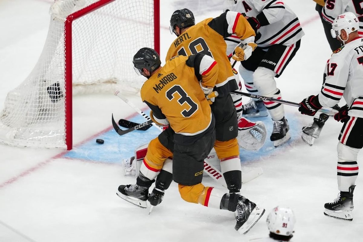 Apr 16, 2024; Las Vegas, Nevada, USA; Vegas Golden Knights defenseman Brayden McNabb (3) scores a goal against the Chicago Blackhawks during the second period at T-Mobile Arena.