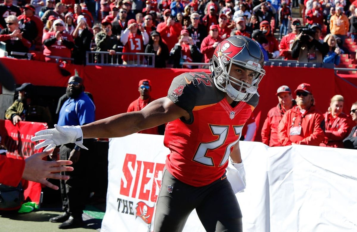 Dec 10, 2017; Tampa, FL, USA; Tampa Bay Buccaneers running back Doug Martin (22) is introduced as he runs out of the tunnel prior to the game at Raymond James Stadium. Mandatory Credit: Kim Klement-Imagn Images
